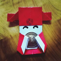 Close-up of red object on table