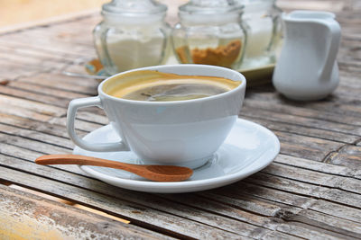 Close-up of coffee cup on table