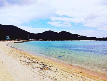 Scenic view of beach against sky