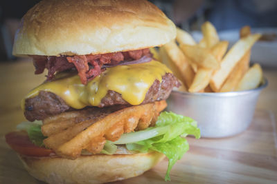 Close-up of burger and vegetables