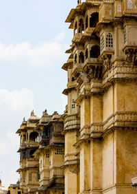 Low angle view of old building against sky