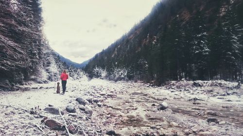 Woman standing on mountain