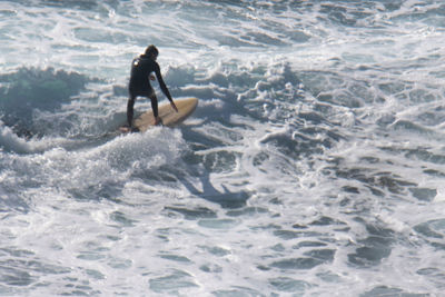 Man surfing in sea