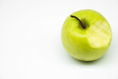 Close-up of apple against white background