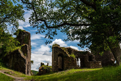 Low angle view of old building against sky