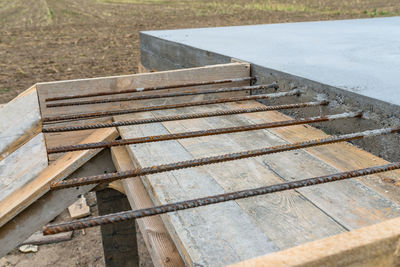 High angle view of bench in park