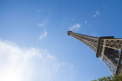 Low angle view of tower against cloudy sky