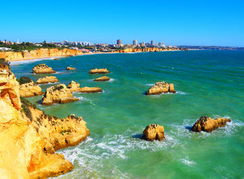 Panoramic view of sea against clear sky