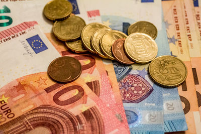 Close-up of coins on table