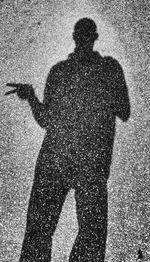 Shadow of man on wall