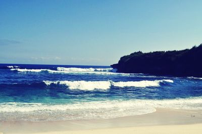 Scenic view of sea against clear sky