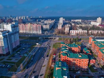 High angle view of street amidst buildings in city