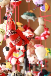 Close-up of red toy hanging at market stall