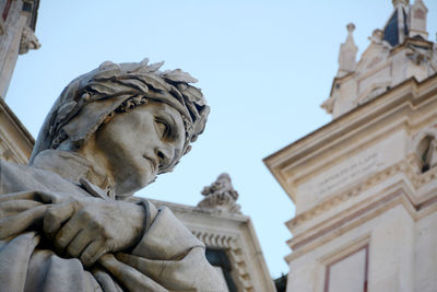 Low angle view of statue of historic building