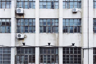 Old industrial building with rusty window frames