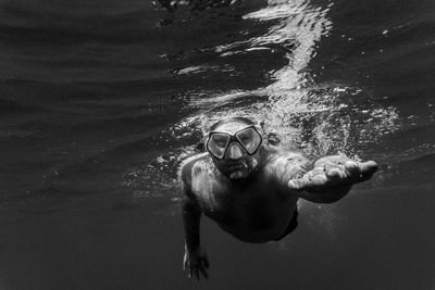 Man swimming in sea