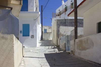 Alley amidst buildings in city