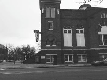 Street by building against clear sky