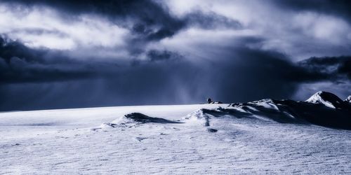 Scenic view of snowcapped mountain against sky