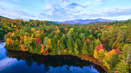 Scenic view of lake against sky during autumn