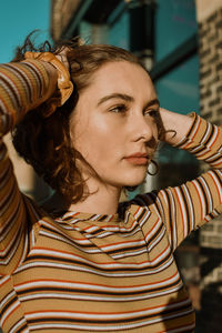 Portrait of young woman looking away