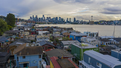 High angle view of buildings in city against sky