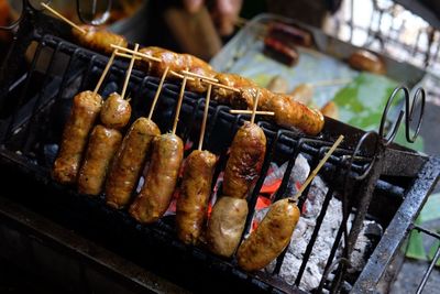 Close-up of meat on barbecue grill