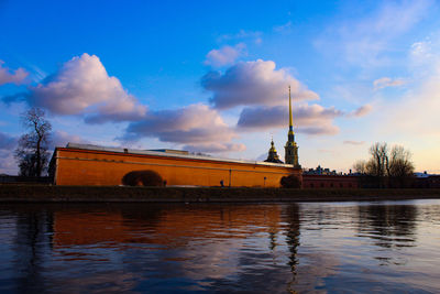 View of bridge over river against buildings