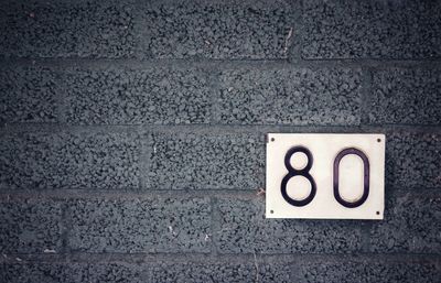 Close-up of text on wall