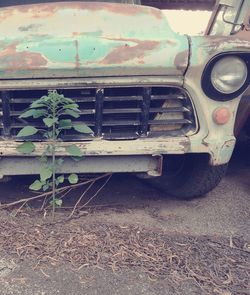 Abandoned car on road