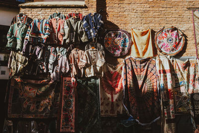 Clothes hanging in store for sale