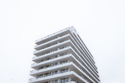 Low angle view of modern building against clear sky