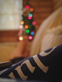 Defocused image of christmas lights at home