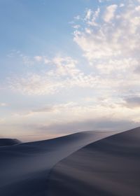 Low angle view of silhouette mountain against sky