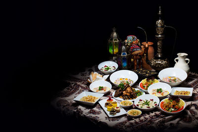 High angle view of food on table against black background