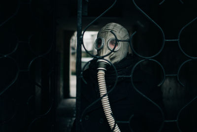 Close-up portrait of man wearing mask