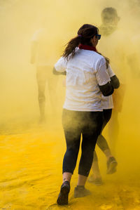 Rear view of people during holi