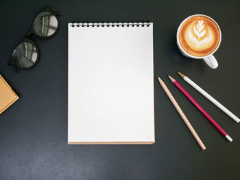 High angle view of coffee cup on table