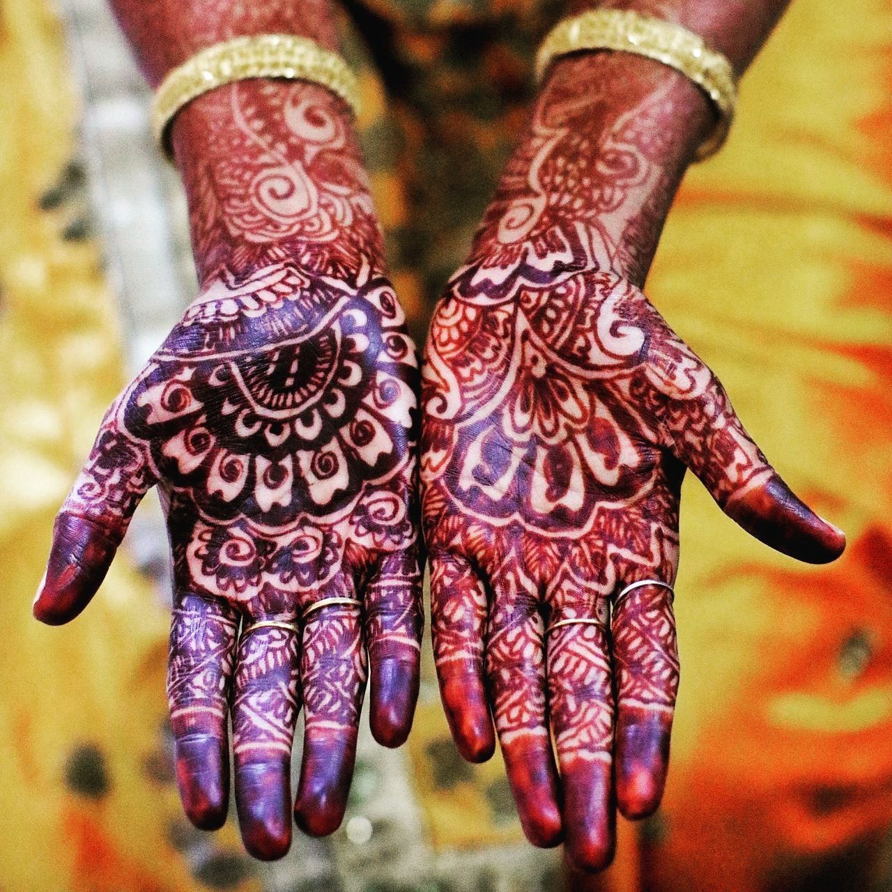 CLOSE-UP LOW SECTION OF WOMAN WITH TATTOO ON HUMAN FEET