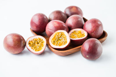 Close-up of fruits against white background