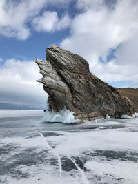 Scenic view of sea against sky during winter