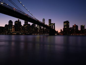 View of suspension bridge at night