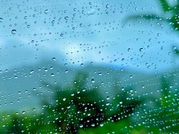 Full frame shot of wet glass window