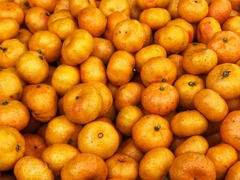 Full frame shot of oranges in market