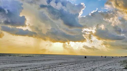 Scenic view of sea against dramatic sky