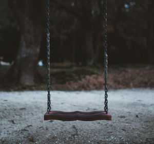 Close-up of swing in playground