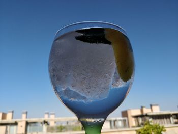Close-up of drink against clear blue sky