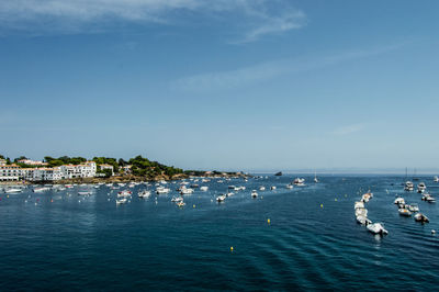 Scenic view of sea against blue sky