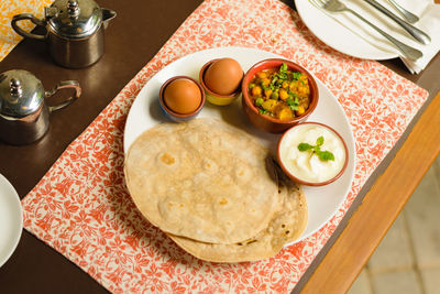 High angle view of breakfast on table