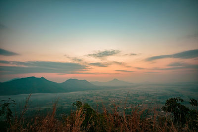 Scenic view of landscape against sky during sunset